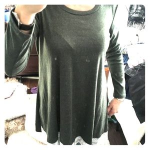 Green women’s tunic with white lace